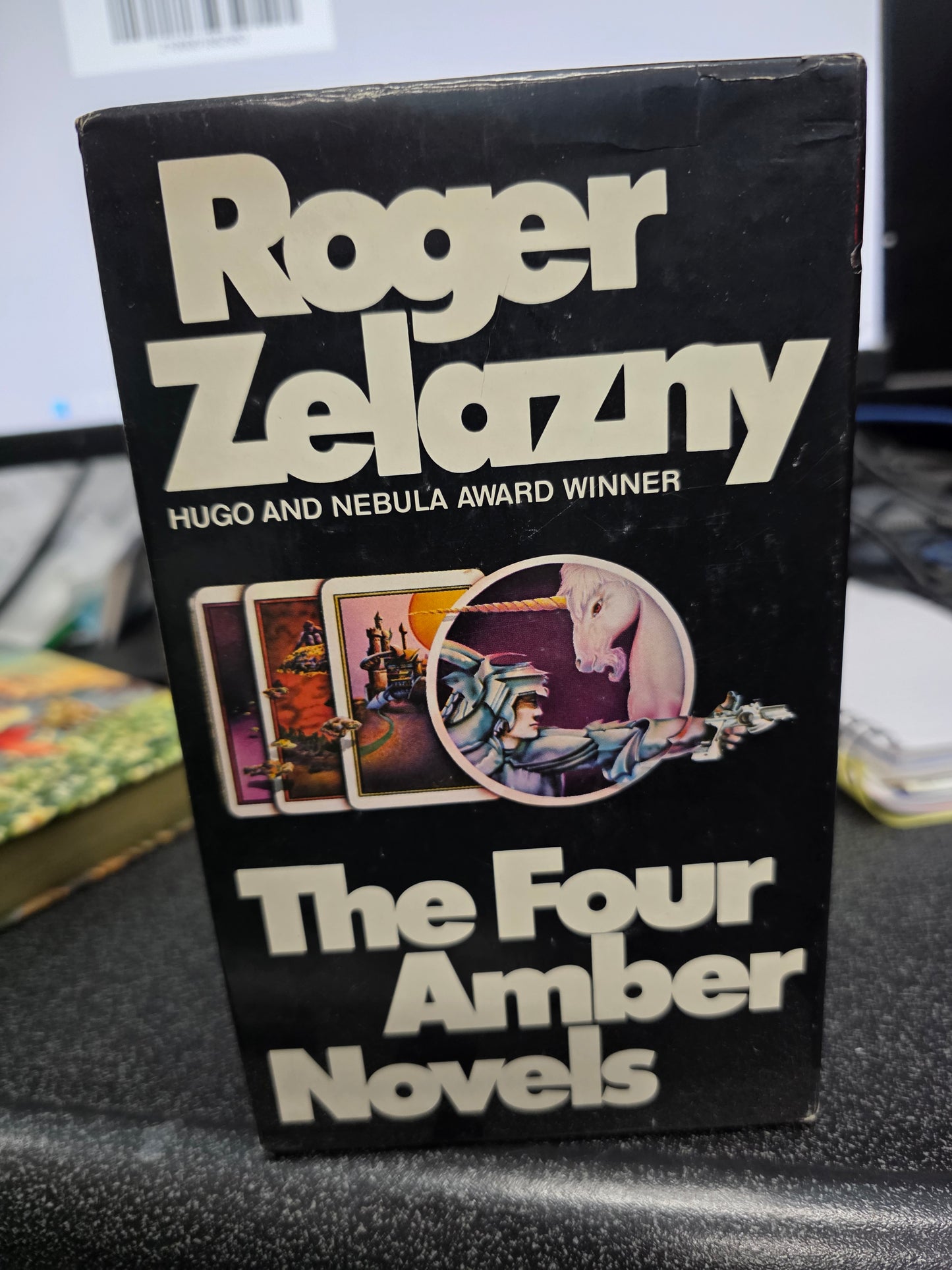 The Four Amber Novels paperback slipcase box set by Roger Zelazny, published by Avon Books in 1978.-USED VG