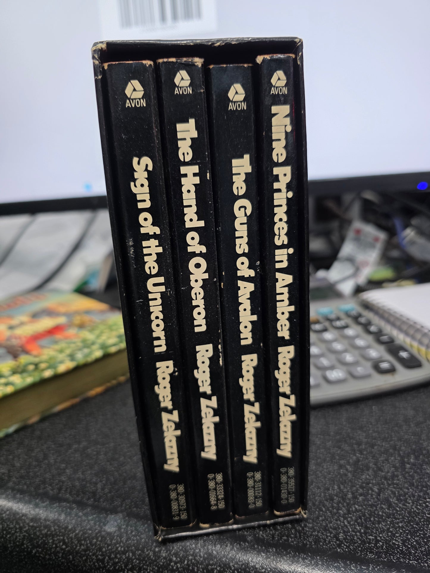 The Four Amber Novels paperback slipcase box set by Roger Zelazny, published by Avon Books in 1978.-USED VG